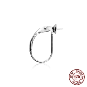 Macro detail of 925 sterling silver leverback earring hooks with cup and peg setting