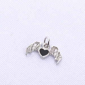 Gothic bat pendant with black heart stone and sparkling zirconia on silver metal