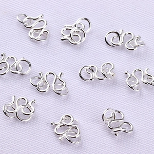 Detailed macro view of S925 sterling silver U-shaped earring clasps for jewelry making