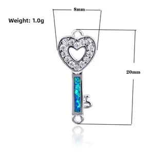 Elegante colgante de llave de corazón en plata con opalo azul y circonita, 20mm