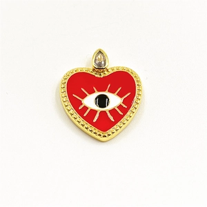 Golden heart pendant with red enamel, evil eye pattern, and sparkling zircon inlay