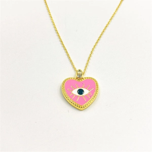 Close-up of pink heart evil eye pendant necklace with micro zircon gold plating