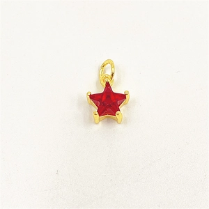 Detailed view of red star-shaped zircon pendant with gold plated metal claw setting