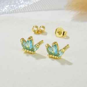 Golden crown earrings with blue marquise cubic zirconia stones and butterfly backs