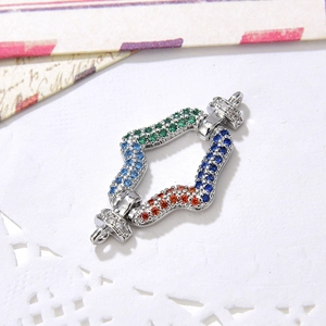 Close-up of rainbow zircon connector buckle with colorful stones for DIY jewelry making