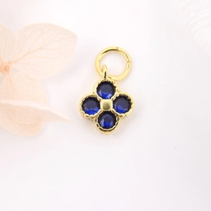 Gold clover pendant with blue cubic zirconia stones for DIY jewelry making