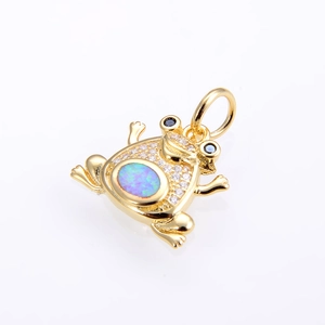 Detailed close-up of a copper frog pendant with inlaid opal and sparkling white zircon stones