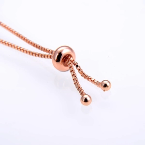 Rose gold box chain bracelet with adjustable sliding closure and polished metal beads