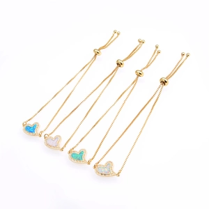 Four heart-shaped opal bracelets in gold finish with sparkling cubic zirconia borders