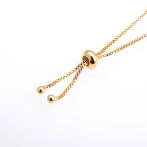 Elegant gold plated box chain bracelet with heart opal and adjustable bolo clasp closure