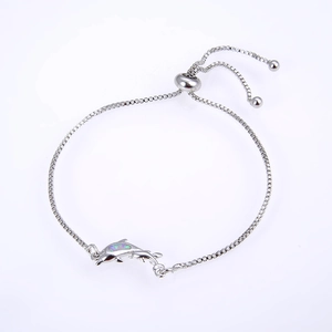 Detail of dolphin opal bolo bracelet with adjustable sliding clasp and box chain design