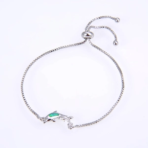 Detail of dolphin charm with blue opal inlay and adjustable silver-tone box chain