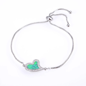 Adjustable silver chain bracelet featuring a heart pendant with opal and sparkling zircons