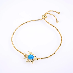 Detail of adjustable golden box chain with tropical fish pendant and blue opal stone