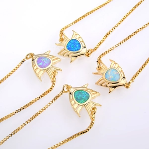 Adjustable gold tropical fish bracelets with colorful opal inlays in four vibrant colors