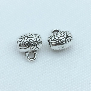 Deux perles cylindriques argentées antiques avec motifs floraux pour bijoux DIY