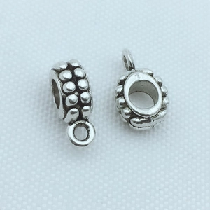 Perles cylindriques creuses argentées avec texture en relief pour la création de bijoux