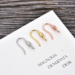 U-shaped DIY earring hooks in gold, silver, and rose gold with spiral texture details
