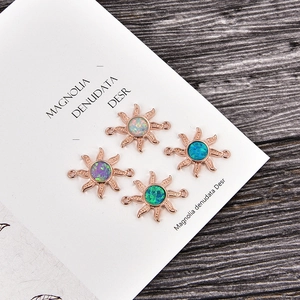 Set de cuatro conectores de opalo sol en oro rosa para creación de joyas DIY