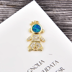 Detailed view of Little Prince opal pendant with gold plating and sparkling zircon stones