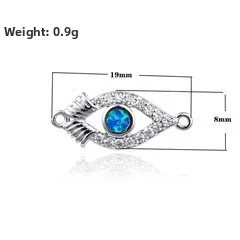 Macro view of evil eye charm connector with blue opal and dimensions 19mm by 8mm