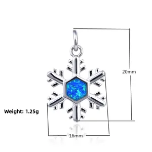 Detailed snowflake pendant with blue opal stone and size specs 20x16mm, 1.25g