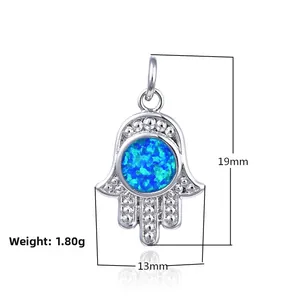 Detailed view of silver Hamsa Hand charm with blue opal stone and size dimensions