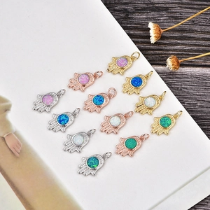 Hamsa Hand pendants with natural opal and zircon in gold, silver, and rose gold plating