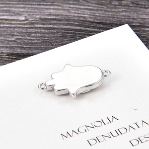 Polished silver Hamsa hand charm with dual connectors for DIY jewelry making