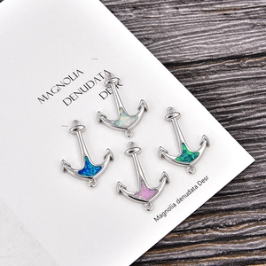 Handmade anchor pendants with colorful opal inlay and sparkling zircons for DIY jewelry