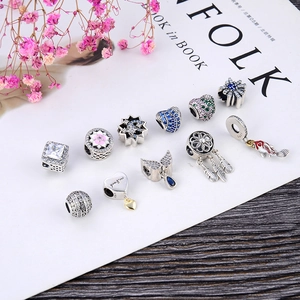 Collection of S925 sterling silver heart and dreamcatcher charms with colorful zircons