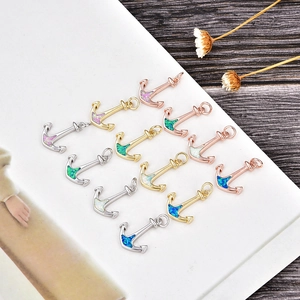 Selection of 12 anchor pendants in gold, silver, and rose gold with colorful opal inlays