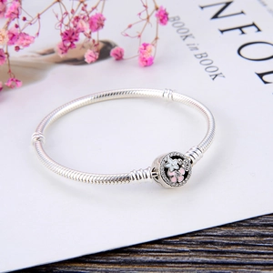 Poetic silver daisy flower charm bracelet with pink enamel and sparkling zircons