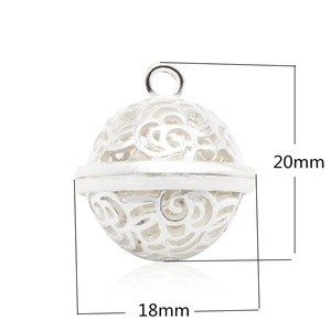 Detailed macro view of 18mm hollow filigree bell pendant with 20mm height dimensions