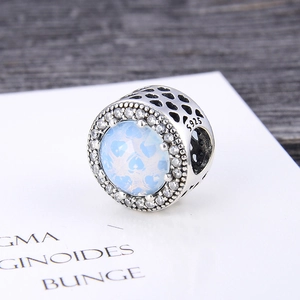 S925 sterling silver heart bead charm with light blue stone and pavé zircon settings