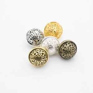 Five hollow filigree metal beads in assorted metallic finishes for DIY jewelry making