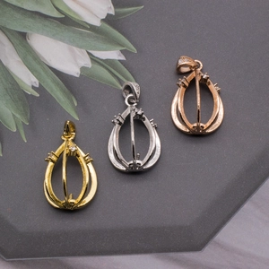 Detailed trio of teardrop hollow frames in gold, silver, and rose gold for pearl settings