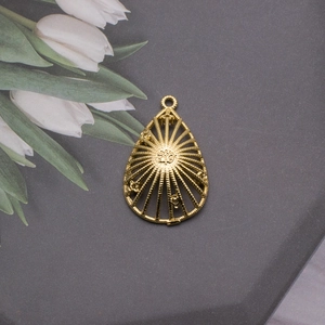 Golden teardrop metal pendant with radial stripe design for DIY jewelry making