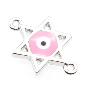 Detail of hexagonal star connector with pink evil eye enamel for jewelry making