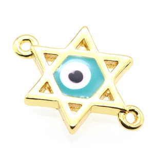 Macro shot of gold Star of David connector with blue evil eye enamel for DIY jewelry
