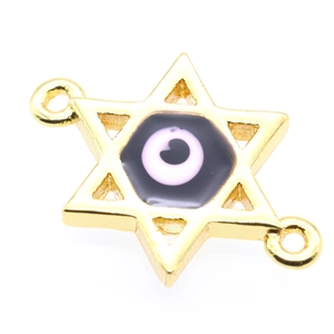 Macro shot of gold-plated Star of David connector with evil eye motif for jewelry making