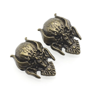 Retro bronze skull head metal pendant beads with vintage embossed punk style design