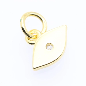 Detailed close-up of a gold-plated evil eye pendant with a sparkling crystal center stone