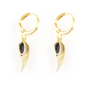 Detailed macro view of golden angel wing earrings with black enamel drop inlay