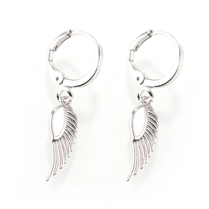 Detail view of silver angel wing earrings with textured feathers and polished ear hoops