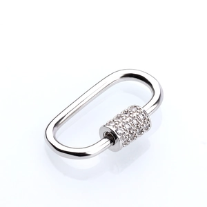 Macro shot of a silver oval carabiner clasp with pavé set cubic zirconia for DIY jewelry