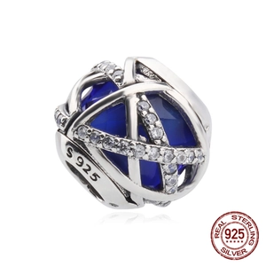 Abalorio de plata de ley S925 con piedra azul facetada y detalles de circonita