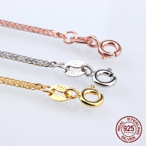 Three S925 sterling silver spiga chains in gold, rose gold and silver finishes with clasps