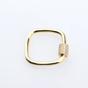 Macro detail of a gold square screw carabiner clasp with sparkling pave-set crystal stones