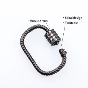 Detailed view of gunmetal spiral jewelry clasp with micro-set mosaic zircon stones